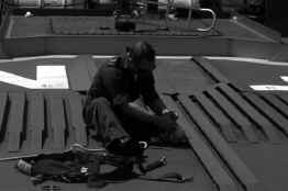 Paul working on the tail tracks on the deck.