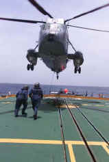 Calling in the groundcrew to release a slung load of "Aqueous Film-forming Foam"  (AFFF)