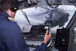 Stevie Hainse as Landing Signals Officer for landing.