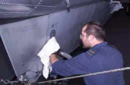 Mark working hard near the tail of the helo.