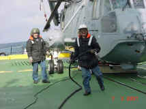 Connecting electrical power to the helo from the ship