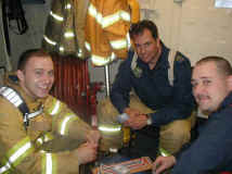 The firefighters while away the hours at flying stations playing cribbage...