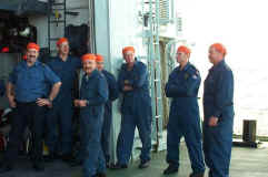 The Hangar Posse waits for the admiral to show up